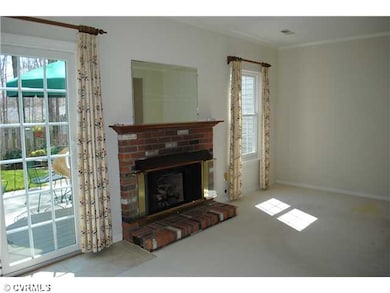 Living Room - Large, bright, gas fireplace.  Opens