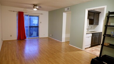 Living/dining combo room with light wood-type floo