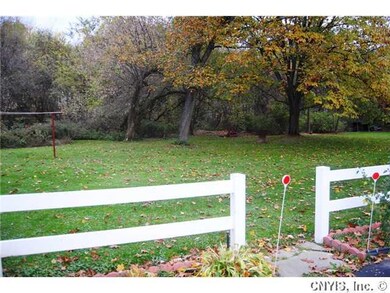 Yard/Garden A level (almost) half acre with mature