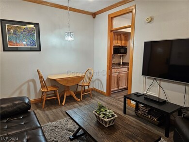 Living Room/Dining Area with sofa bed