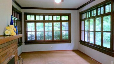 22.5' x 12' with walls of windows, crown molding, 