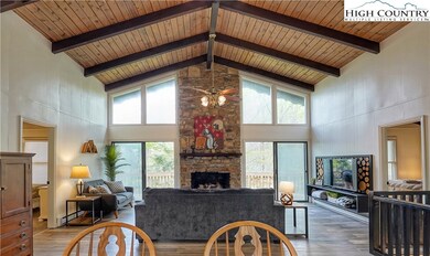 Large open floor plan with high vaulted T & G Ceil