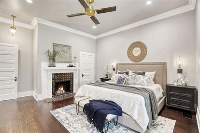 Fireplace with original tile in downstairs Primary