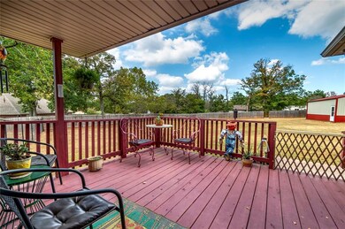 Wooden terrace with a lawn