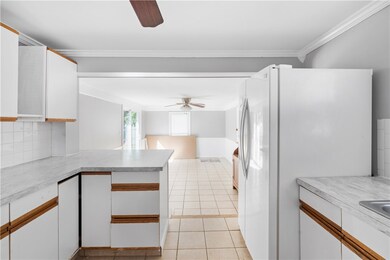 Kitchen with new countertop looking into a lovely