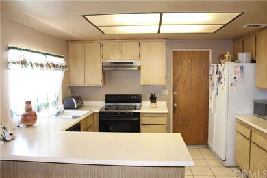 Nice open Kitchen , it opens up to family-room wit