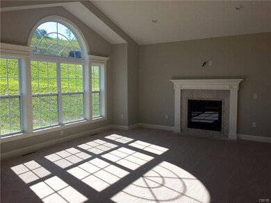 Family Room. Magnificent wall of windows adds grac