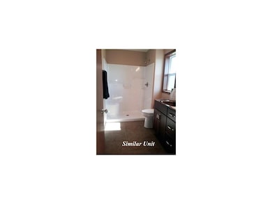 Master Bathroom. Picture is of similar unit.