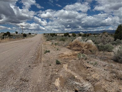 View of dirt / gravel road with a view of countrys