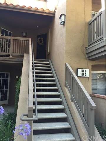 Stairs to Unit H front door.