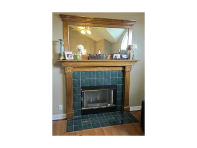 Beautiful Fireplace with Custom Mantel & Mirror