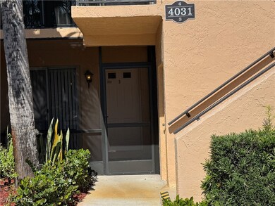 Doorway to property with stucco siding