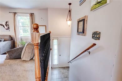 Enter & up 1/2 flight of stairs to the primary liv