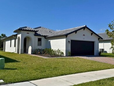 Mediterranean / spanish-style home featuring an at
