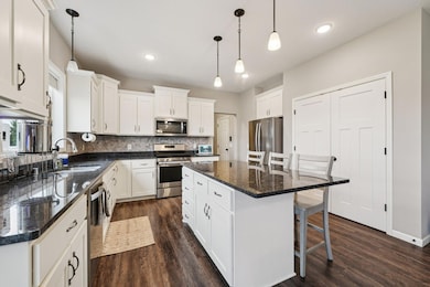 Adjacent powder room and mud room is just around the corner!