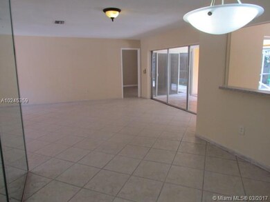 Living Room leads to a covered patio overlooking t