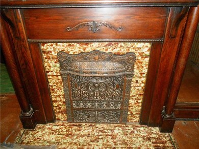 One of the four decorative fireplaces in this home
