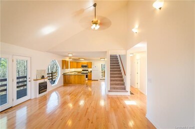 Vaulted ceiling in the living room which opens int