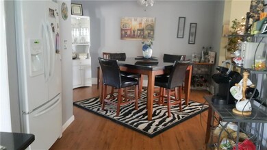 Original dining room opens into kitchen