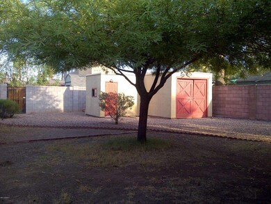 Single car garage and wash house