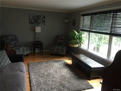 Living Room, with hardwood floors & a beautiful fr