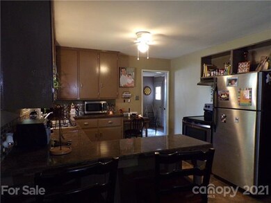 Updated Kitchen with Formica Counter Tops and Bar