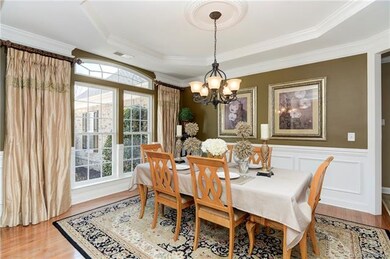 Formal dining area, hardwood floors, crown molding