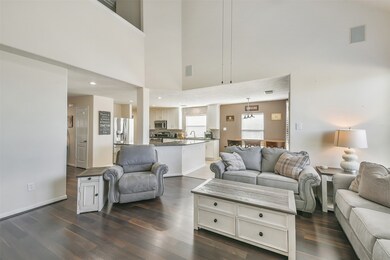 Your Family room with a high ceiling, overlook fro
