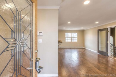Stunning leaded glass door opens to spacious livin