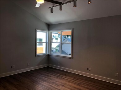 Unfurnished room featuring baseboards, a ceiling 
