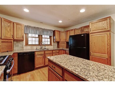 Large kitchen with island and eat in kitchen.  Gra