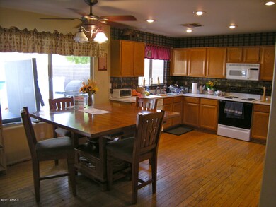 Country kitchen opens to family room