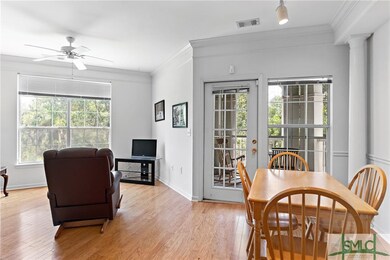 Open living area  and screen porch overlook greens
