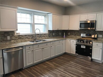 Kitchen with NEW stainless steel appliances