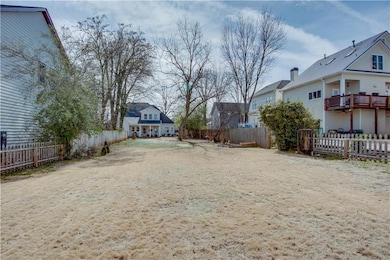 View of fenced backyard