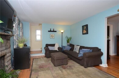 LIVING ROOM;  provides access to 2nd floor bedroom