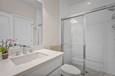 The pretty first-floor ensuite bathroom is ideal f