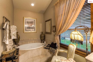 Travertine, soaker tub, dual sinks, large shower, 