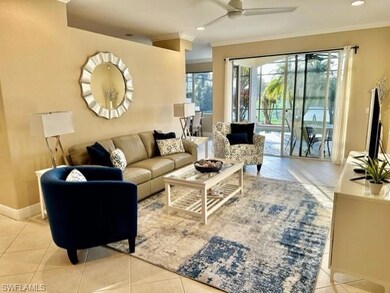 Living area with light tile patterned floors, rece