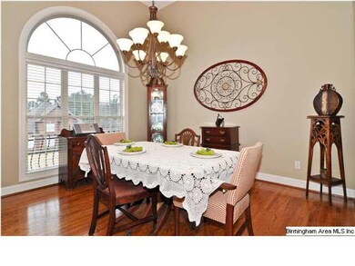 Formal dining room conveniently situated between k