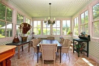 Light Filled Sun Room has radiant heating in the f