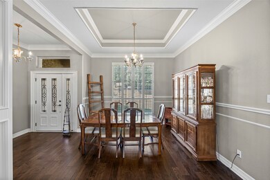 Front door and formal dining room