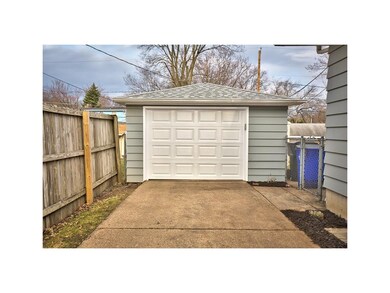 Garage with BRAND NEW garage door!