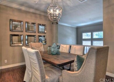 Formal dining room opens to kitchen and great room