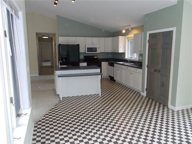 View of kitchen from dining area