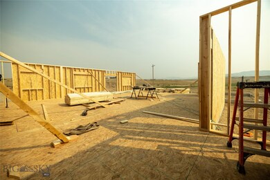 External perimeter walls going up. View from the f