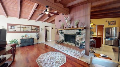 Living Room with wood burning fireplace