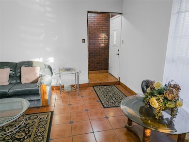 View of tiled living room
