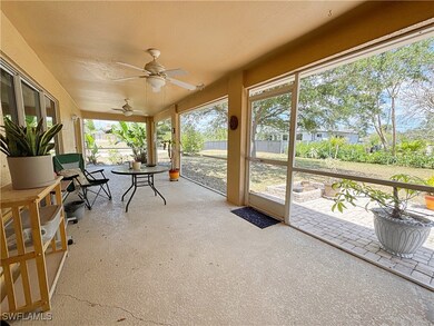 Sunroom / solarium with a ceiling fan