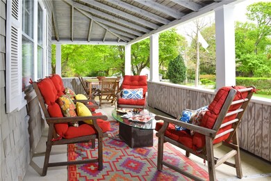 Generous Front Porch is perfect for large gatherin